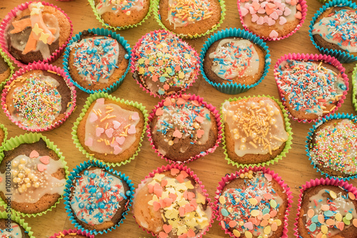 Delicious cup cakes / Tasty decorated cup cakes made by children ready to eat with lots of sugary toppings delicious