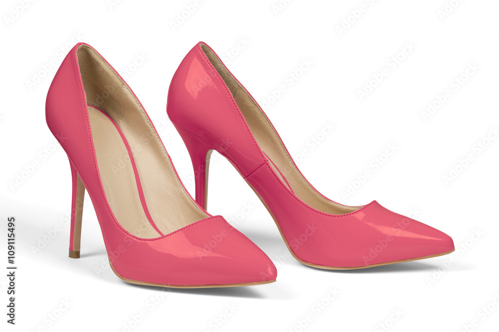 A pair of red high heel shoes isolated on white with clipping path. A pair of red high heel shoes isolated on white with clipping path.