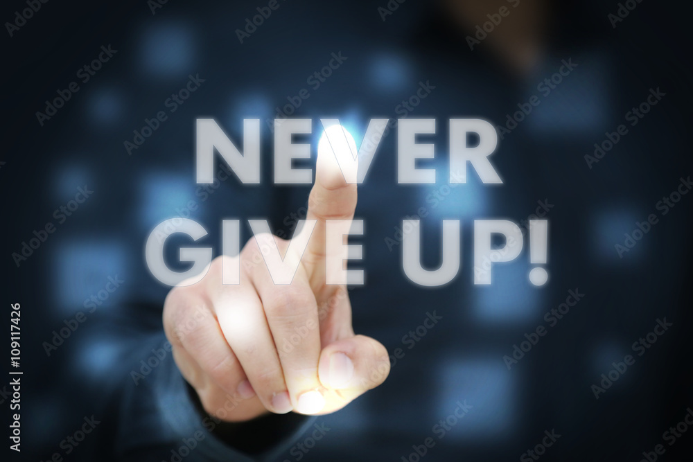 Businessman touching Never Give Up! Businessman touching Never Give Up!