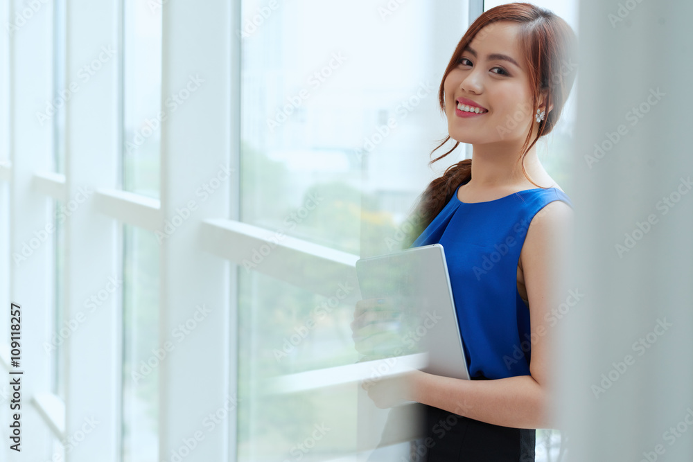 Portrait of young Vietnamese business lady in office Portrait of young Vietnamese business lady in office