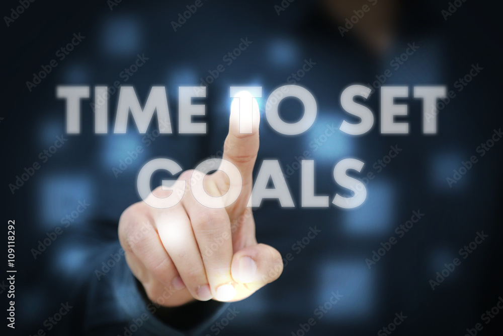 Businessman touching Time To Set Goals Businessman touching Time To Set Goals