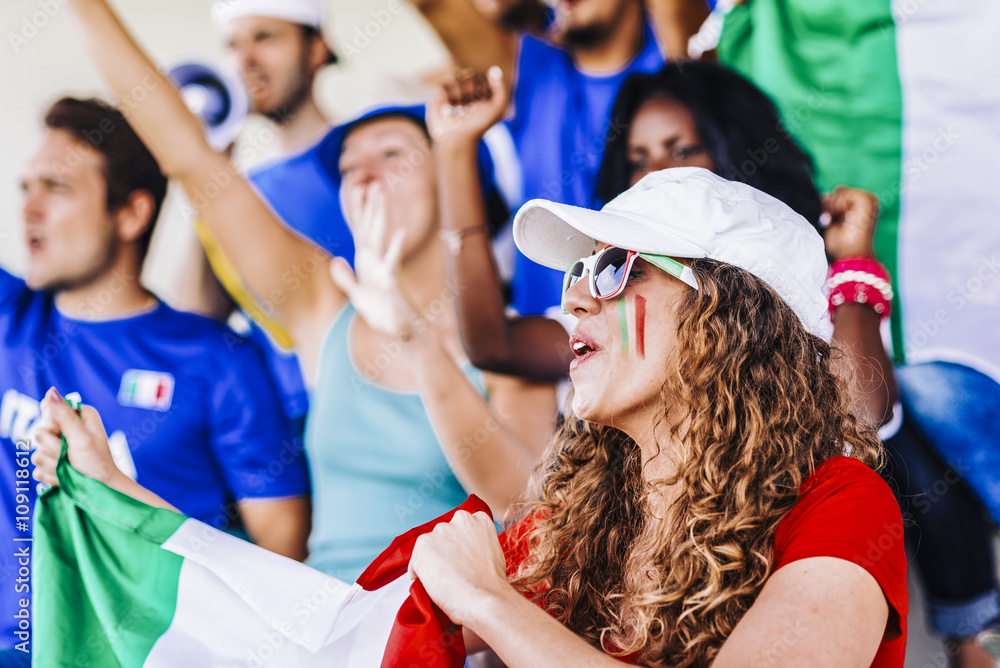Obraz premium Supporters from Italy at stadium watching the match