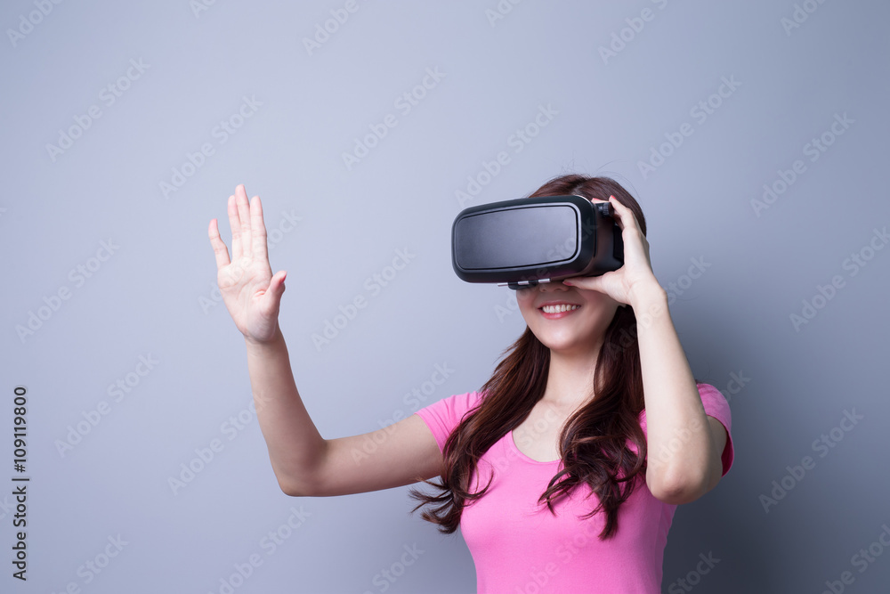 woman using VR headset glasses woman using VR headset glasses