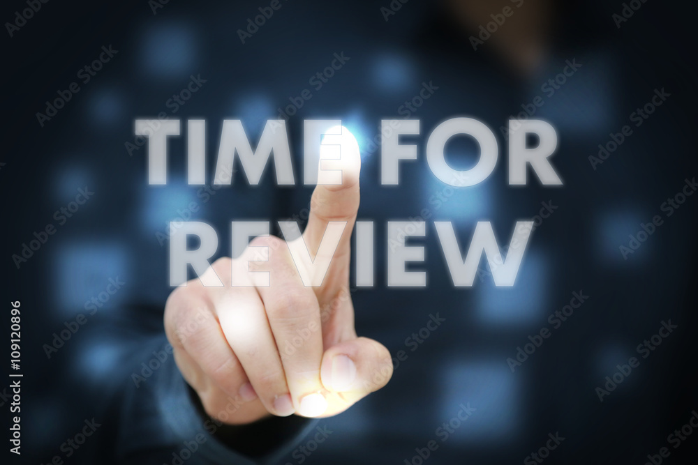 Businessman touching Time For Review Businessman touching Time For Review