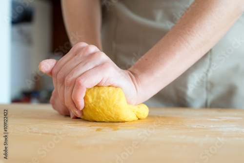 Tableau sur toile woman hands kneading dough for homemade fresh pasta