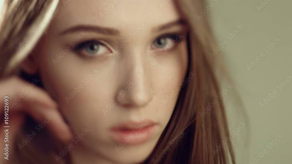 Sensual woman with long straight hair on a photo shoot Sensual woman with long straight hair on a photo shoot