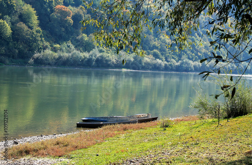 Photography The boat on the river bank in a quiet backwater