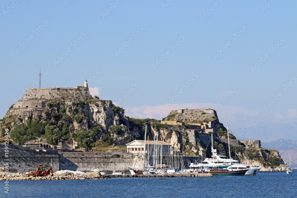 sailboats and yachts under old fortress Corfu town