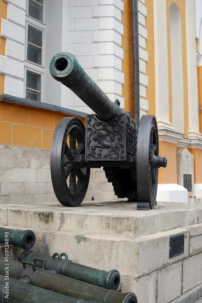Old cannon in Moscow Kremlin. Color photo. Old cannon in Moscow Kremlin. Color photo.