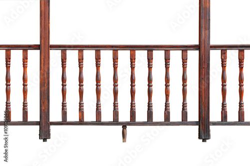Fototapet Wooden railing of a balcony with balusters isolated on white background