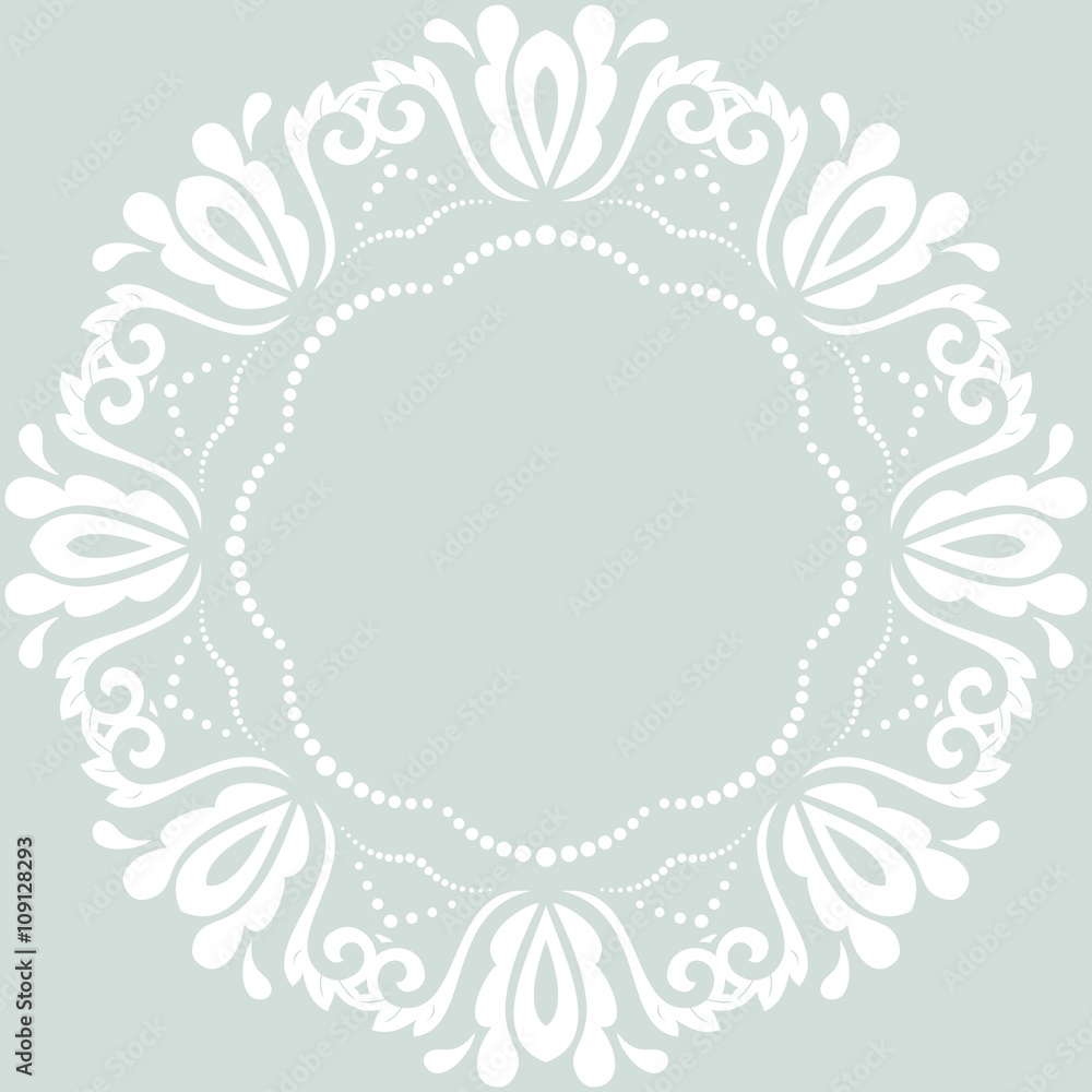 Oriental vector white round frame with arabesques and floral elements. Floral fine border. Greeting card with place for text Oriental vector white round frame with arabesques and floral elements. Floral fine border. Greeting card with place for text