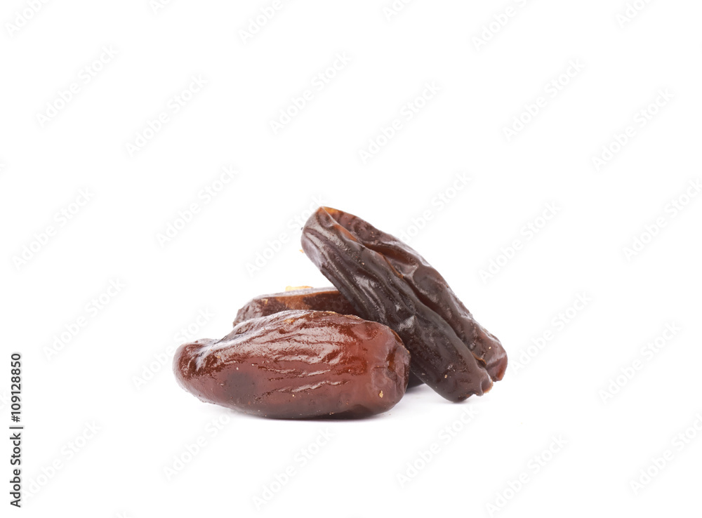 Pile of date fruits over isolated white background surface