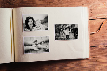 Mothers day composition. Photo album, black-and-white pictures.