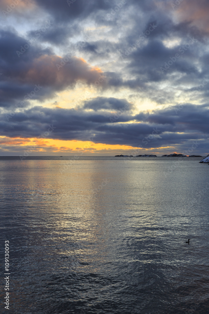 Sunset at Henningsvaer shoreline on Lofoten Islands, Austvagoya, Nordland, Norway