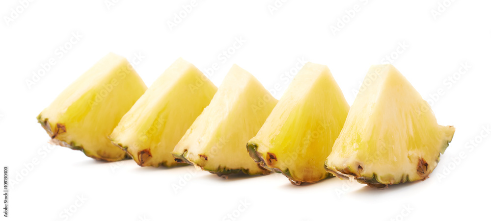 Slices of pineapple isolated over white background Slices of pineapple isolated over white background