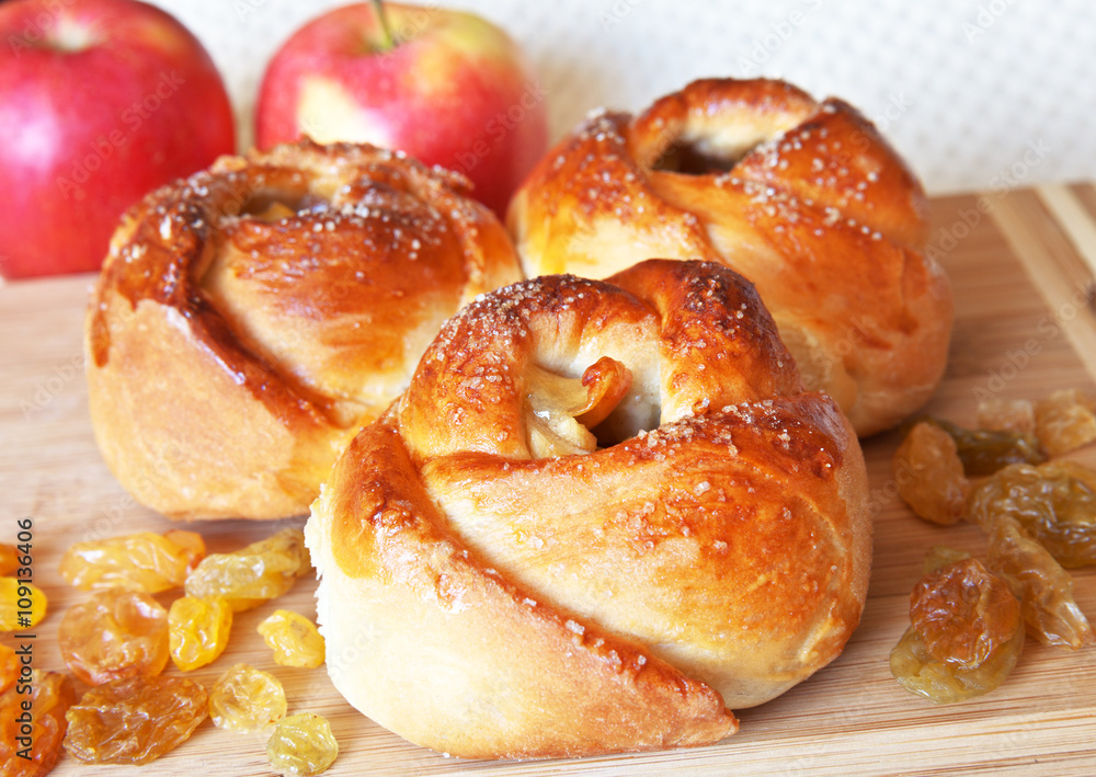 Home rosy buns with raisins and apple Home rosy buns with raisins and apple