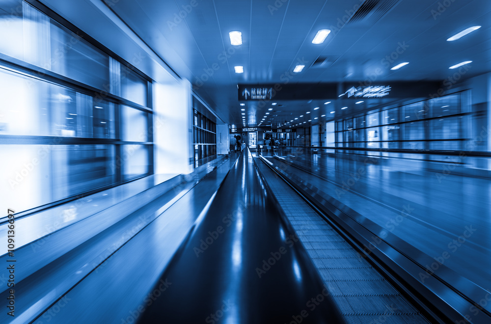 moving walkways at pudong international airport,motion blurred. moving walkways at pudong international airport,motion blurred.