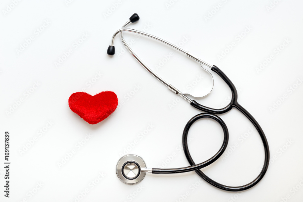 stethoscope on white background with plush heart stethoscope on white background with plush heart