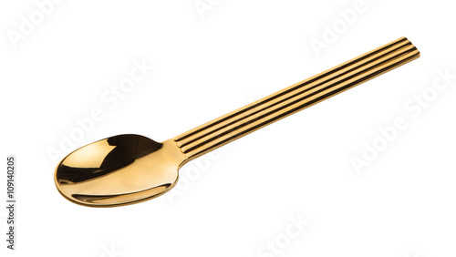 Gold spoon isolated on white