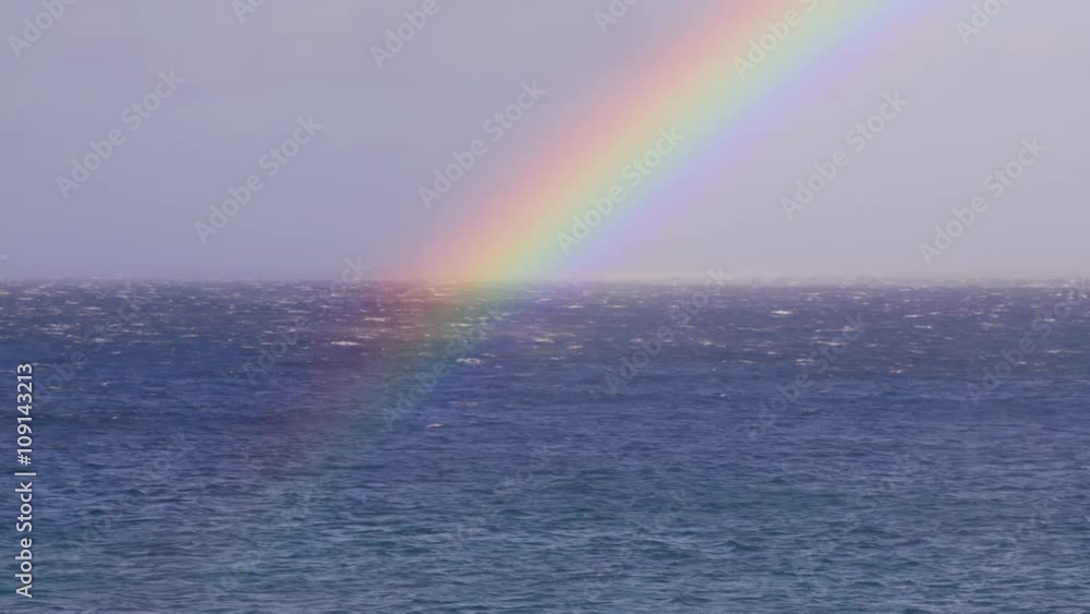 Rainbow over the ocean in Hawaii. Rainbow over the ocean in Hawaii.