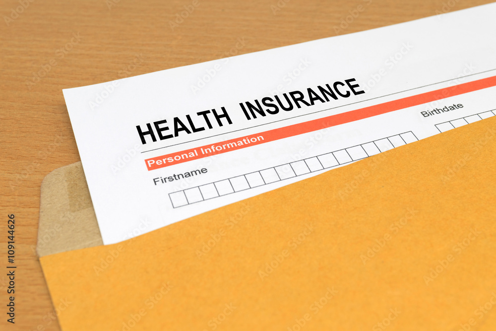 health Insurance application form on brown envelope health Insurance application form on brown envelope