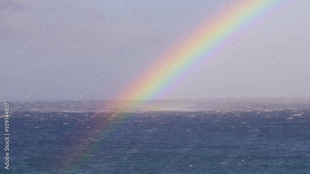 Rainbow over the ocean in Hawaii. Rainbow over the ocean in Hawaii.