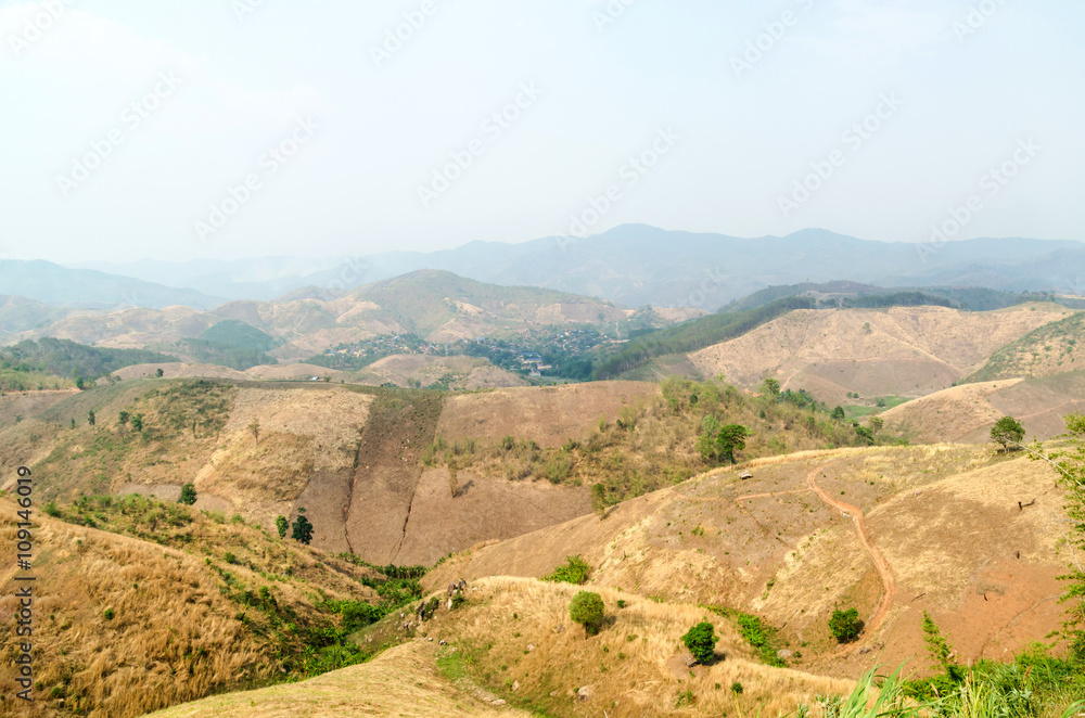 Fototapeta premium disaster dry areas of mountain with wildfire smog in summer Thailand