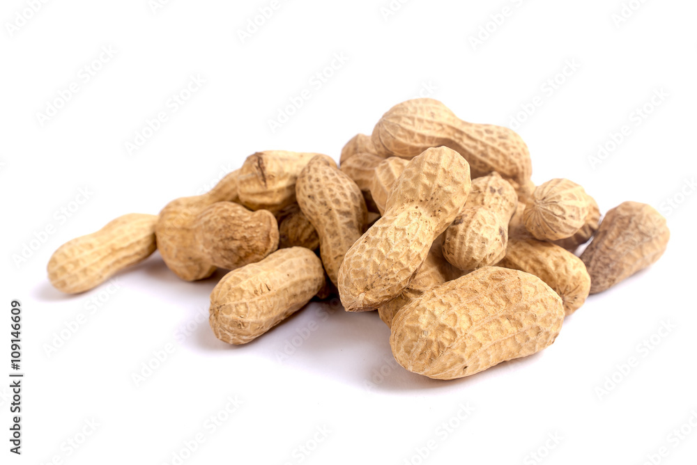 peanuts in closeup on white background peanuts in closeup on white background