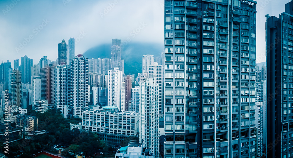 apartments in hongkong,blue toned image.