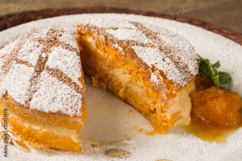 Delicious dessert of naked pumpkin cake on the plate