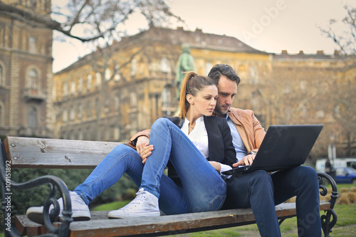 Couple sitting at the park