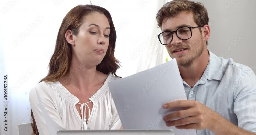 Businesswoman and businessman disagreeing Businesswoman and businessman disagreeing