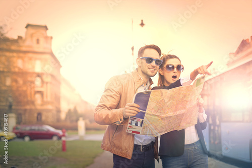 Tourists holding a map
