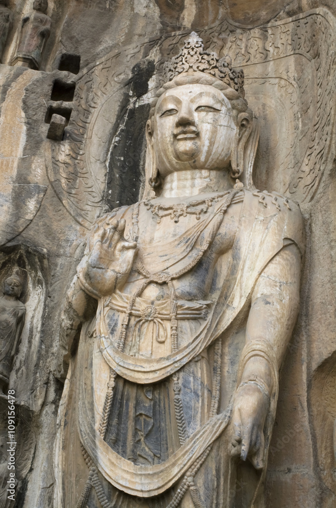 Close up Buddha rock statue in Longmen Grottoes, Luoyang, China