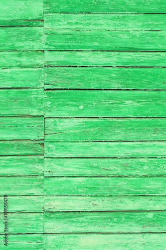 Old wooden wall painted light green copyspace