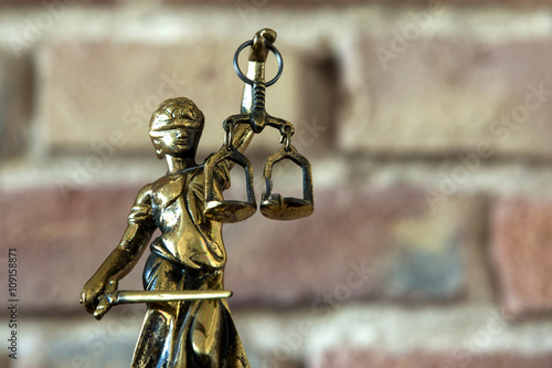 Lady Justice - Temida - Themis, Lady of Justice on background of the wall 