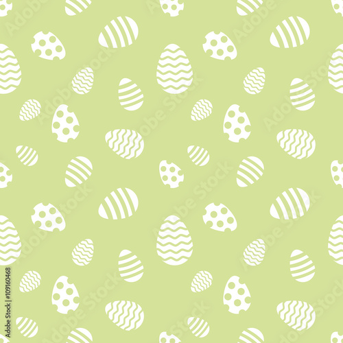 Seamless green and white Easter eggs vector pattern.