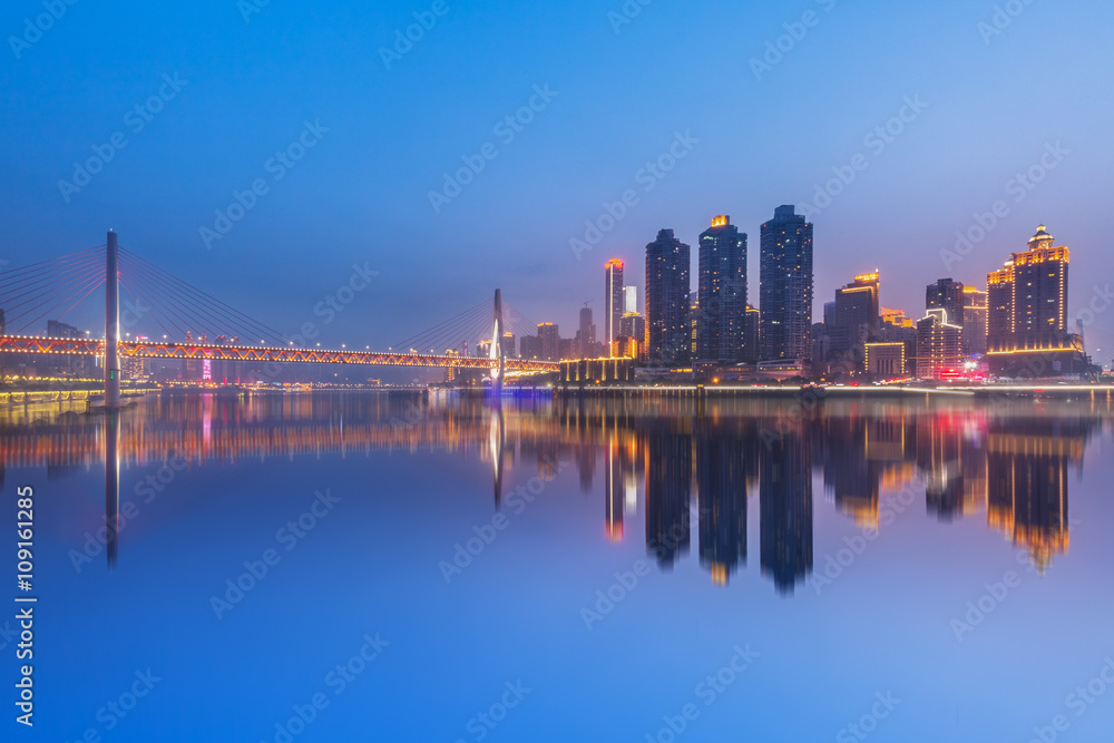 Chongqing,China night cityscape at the Jialing River and Qianximen Bridge