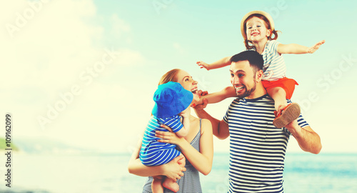 happy family of father, mother and two children, baby son and da