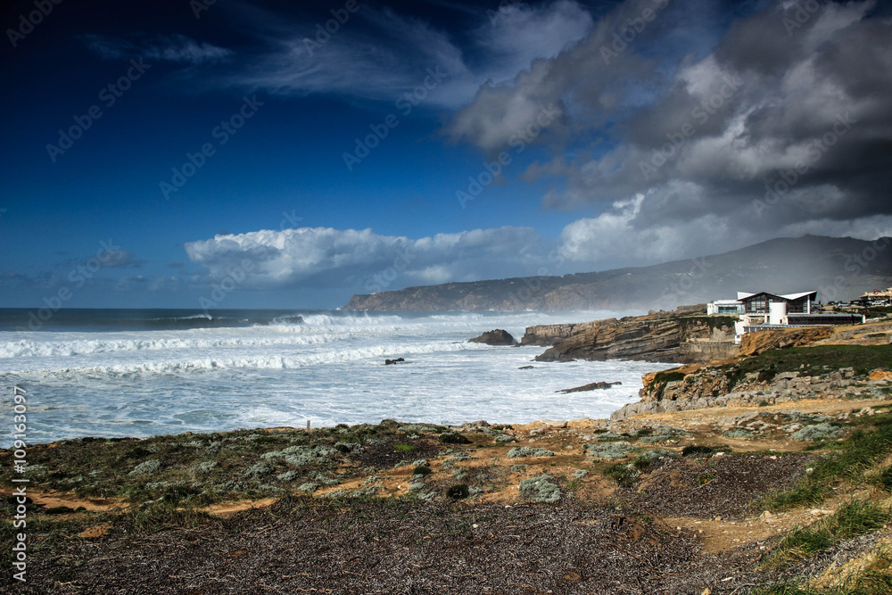 Cliff in the Portuguese coastline near from guincho beach in cascais Portugal in a stormy day