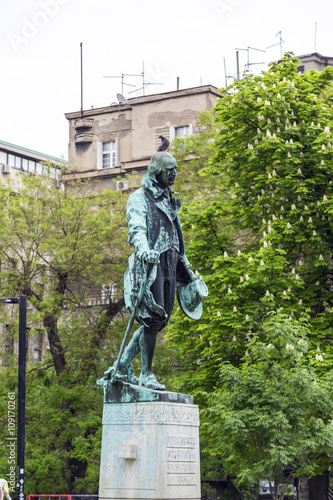 View from The Studentski Park (Academic Park) on Trg Studentski (Students Square, Avenue) with statues of important Serbian figures photo