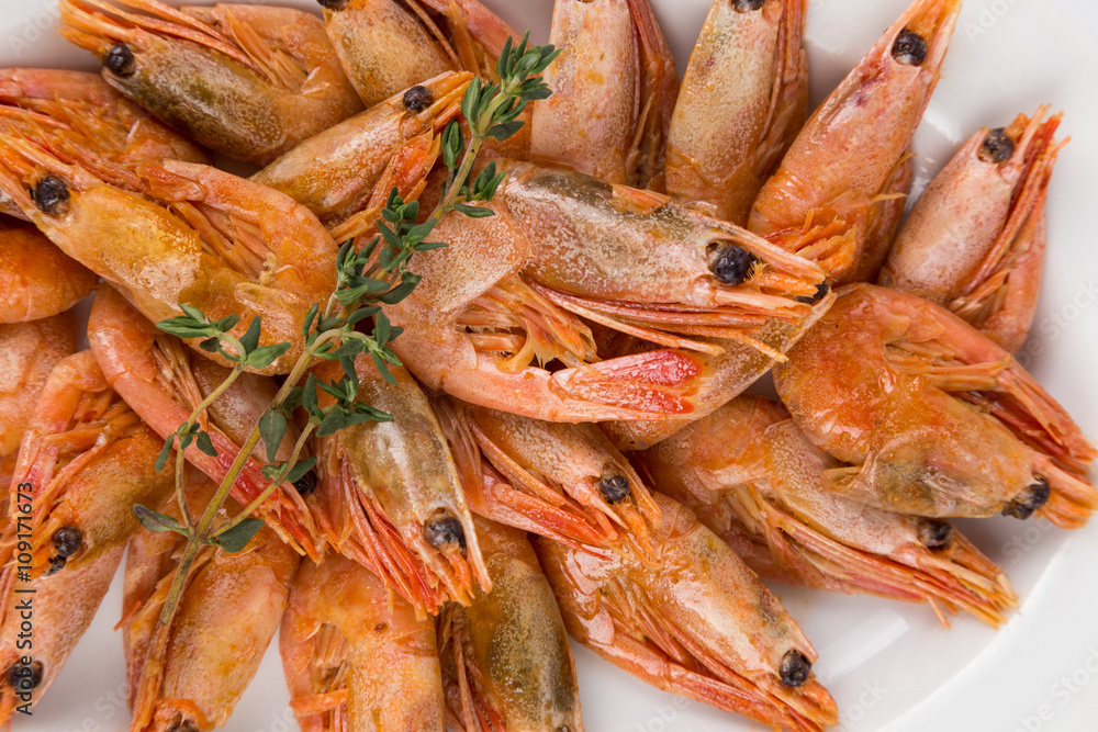 portion hot shrimps on white plate