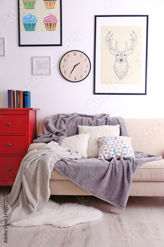 Beige sofa in the room inte...