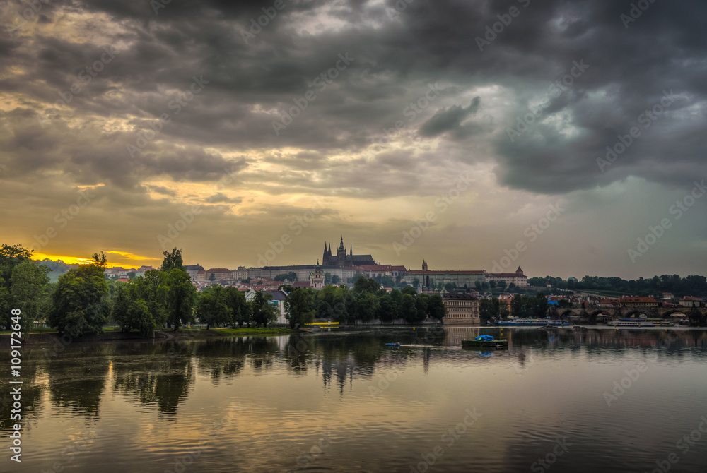 Charles Bridge and castle with reflection in rainy day.Prague,Czech Republic.