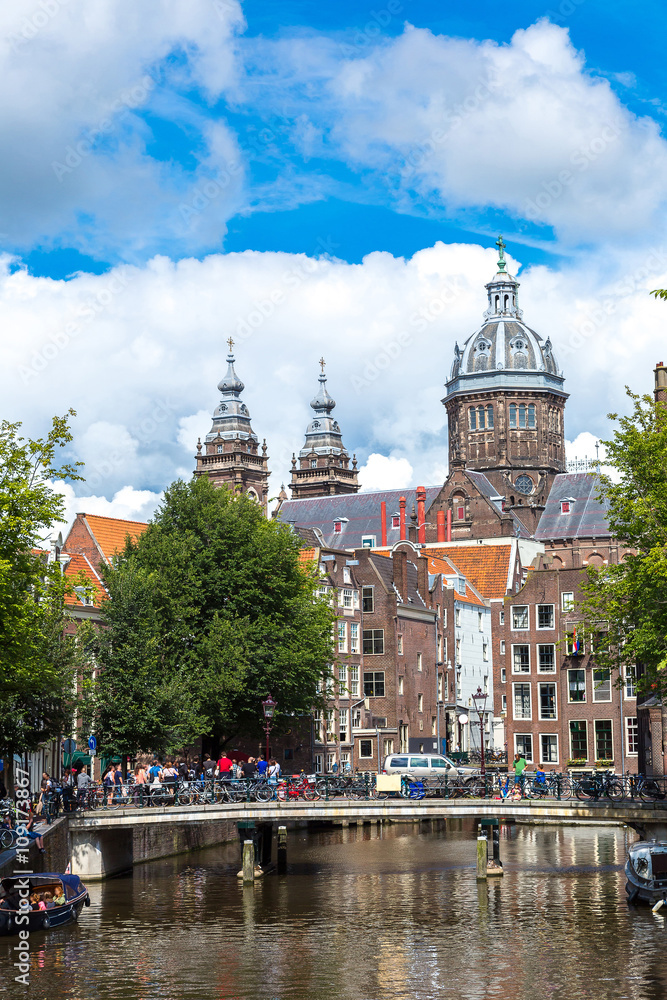 Fototapeta premium Canal and St. Nicolas Church in Amsterdam