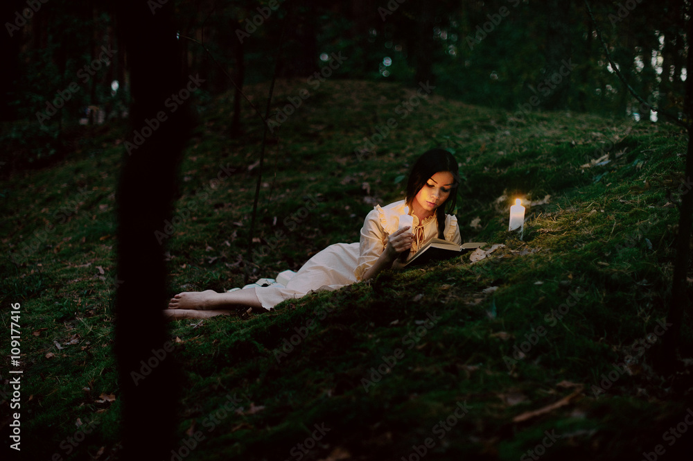 Portrait of a beautiful woman in the forest Portrait of a beautiful woman in the forest