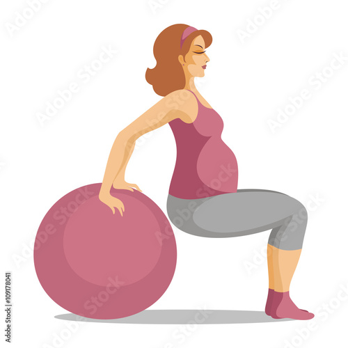 the young beautiful pregnant woman does gymnastics with a fitball