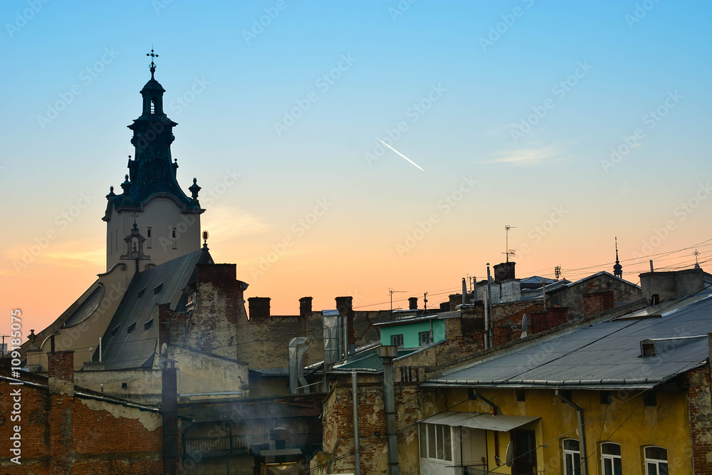 Twilight view of medieval Lviv city, Ukraine. Sunset cityscape. Latin Cathedral, the main catholic church of Lviv Twilight view of medieval Lviv city, Ukraine. Sunset cityscape. Latin Cathedral, the main catholic church of Lviv