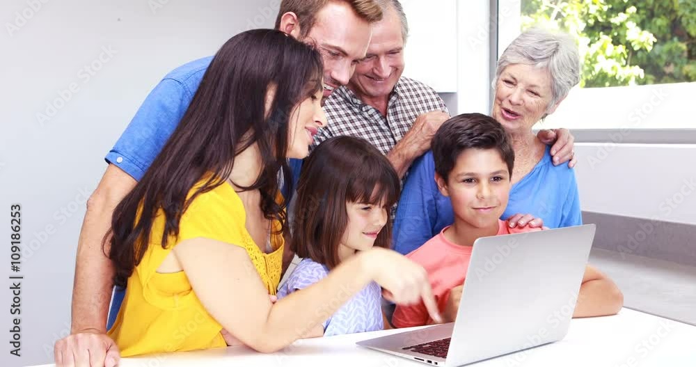 Happy family using a laptop Happy family using a laptop