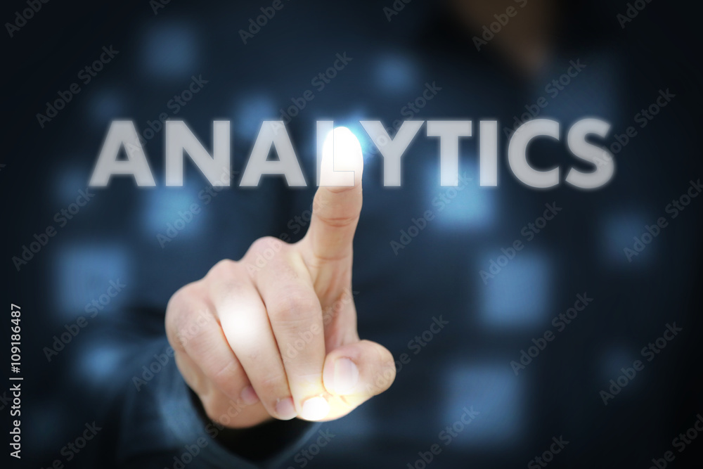 Businessman touching Analytics Businessman touching Analytics